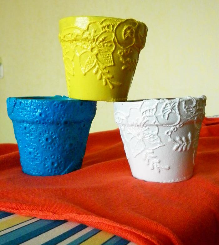 Decoupage of flower pots with fabric